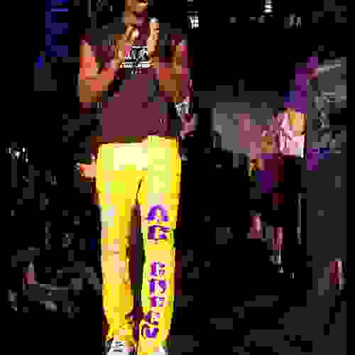 AC Green on fashion runway with custom pants by Sam Roloff